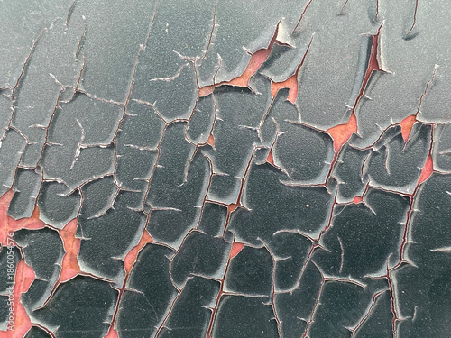 cracked paint on a car wall