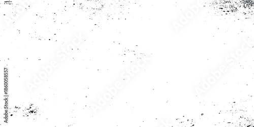 A predominantly grunge white image with scattered dark specks and grepsny texture resembling dust or imperfections