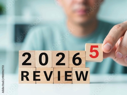 Business Review 2025 Turning Into 2026 on Wooden Blocks for Strategic Planning