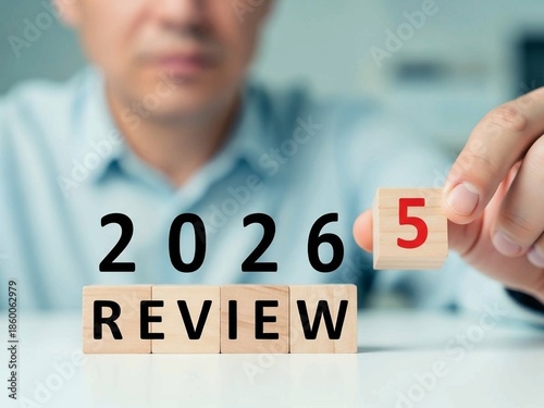 Business Review 2025 Turning Into 2026 on Wooden Blocks for Strategic Planning