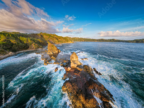 Exploring the Natural Beauty of Watu Lumbung Beach in Gunung Kidul, Central Java, Indonesia During the Sunny Afternoon