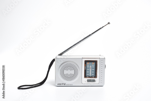 Portable battery-powered AM/FM radio photographed against a white background.