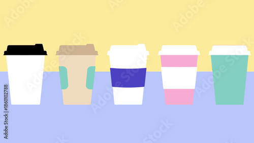 Assorted coffee cups with different designs and colors.