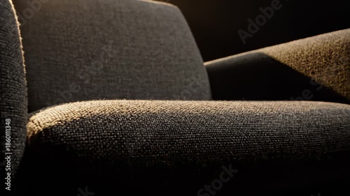 Closeup of Fabric Armchair Texture Details in Dramatic Lighting