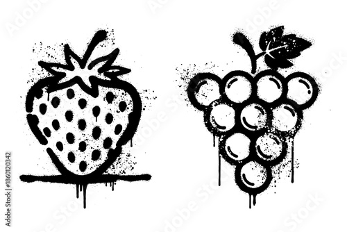 Black spray paint graffiti of strawberry and grape fruit with street art drips