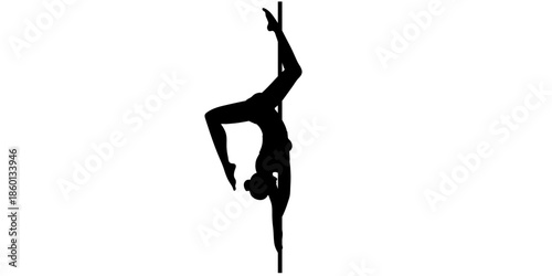 Silhouette of woman performing acrobatic pole dance move