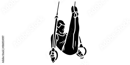 Man performing gymnastics on still rings with dynamic movement