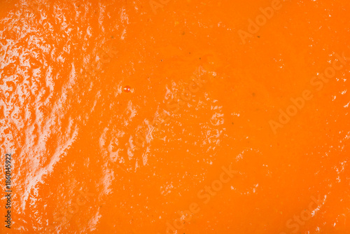Konstfotografi A full frame macro shot showcasing the vibrant orange color and thick smooth tex