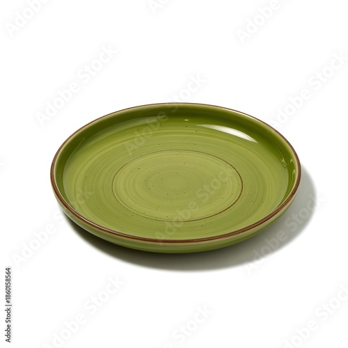 Green ceramic plate with brown rim and circular design on a white background