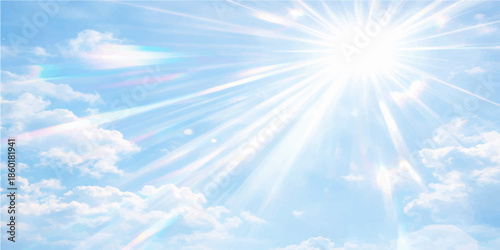 Beautiful bright sun in a clear blue sky with white clouds creates a stunning summer nature cloudscape full of sunlight and light