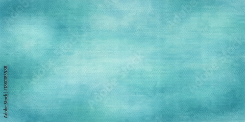 A vintage blue grunge background features a rough textured pattern on aged paper and paint-splattered canvas material for an abstract artistic backdrop