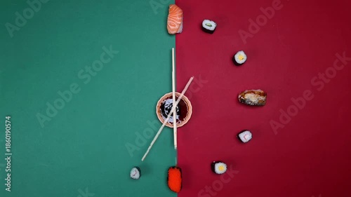stop motion sushi chopsticks hour minutes hand mini sauce bowl rotating on green red paper clock watch time