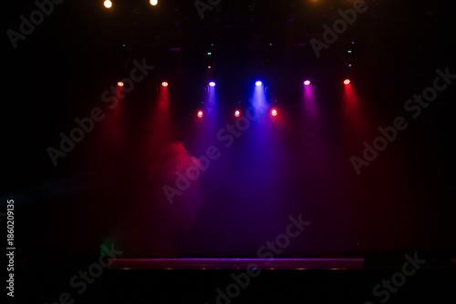 Theater and concert stage, colored smoke in stage light	