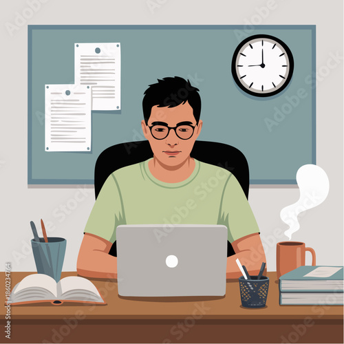 Focused man working at laptop at desk.