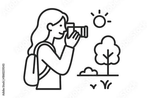 Woman taking photos outdoors with a camera