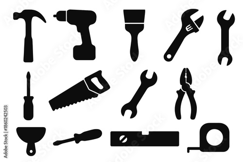 Black silhouette icons of various tools on a dark gray background