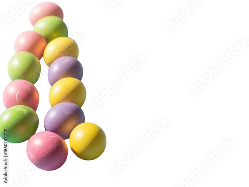 Easter candy eggs in various colors on transparent background