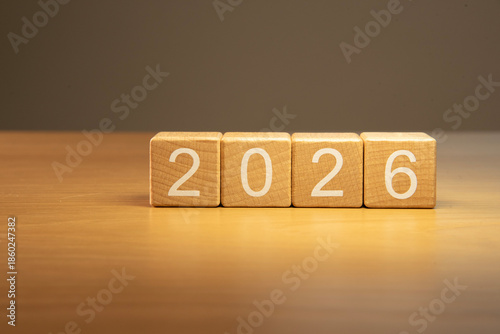 Craft wooden cube blocks 2026. Numbers on wooden blocks with copy space. 2026 happy new year idea concept.