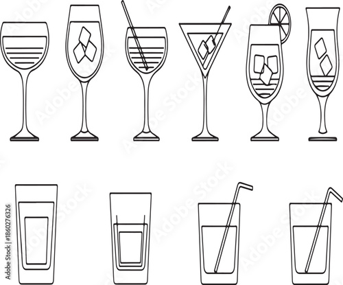 Variety of elegant cocktail glasses and tumblers with drinks