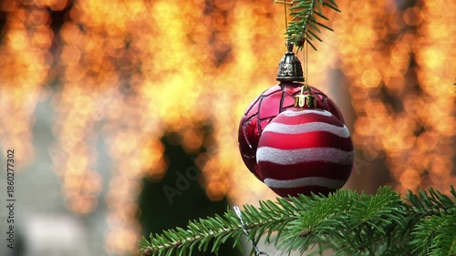 Round Red Christmas Ornaments Hanging on Christmas Tree