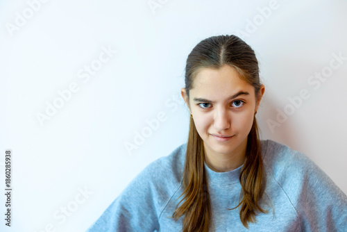 Konstfotografi Teen girl with skeptical facial expression