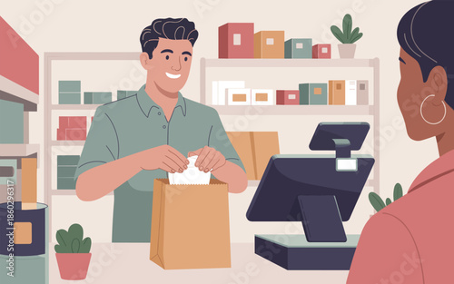 A shop assistant handing a customer a package at a checkout counter in a store.