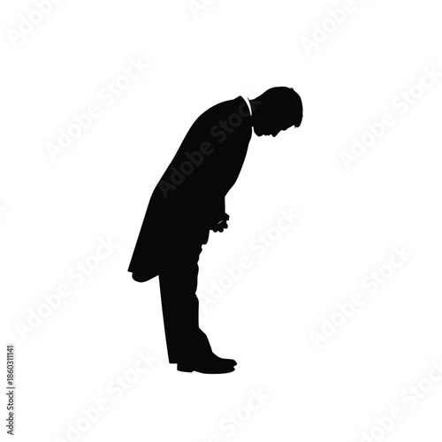 Silhouette of man bowing in respect or greeting