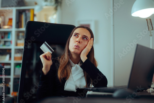 Bilde på lerret Woman Holding a Credit Card  Thinking about Buying Something