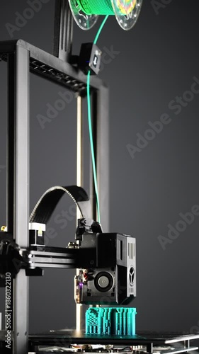 3D printer printing plastic parts at a modern factory demonstrating advanced manufacturing technology innovation and automated industrial production processes. High quality 4k footage