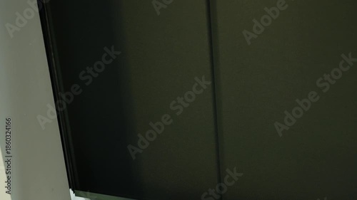 Automatic garage door closing with smart home technology demonstrating modern residential automation safety convenience and innovative living solutions. High quality 4k footage