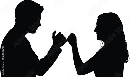Silhouette of a man and woman in a confrontational or playful gesture