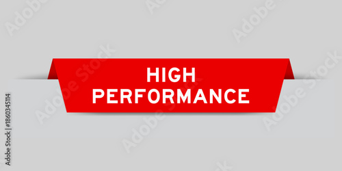 Red color inserted label with word high performance on gray background