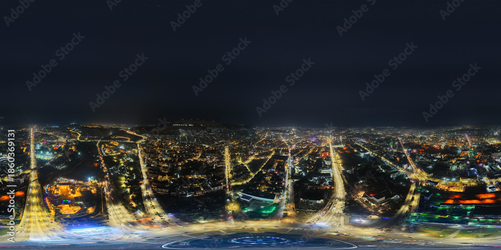 Fototapeta premium A 360-degree aerial image captures the Syrian capital at night, showing the city fully illuminated and offering a panoramic view of Damascus as the year draws to a close.