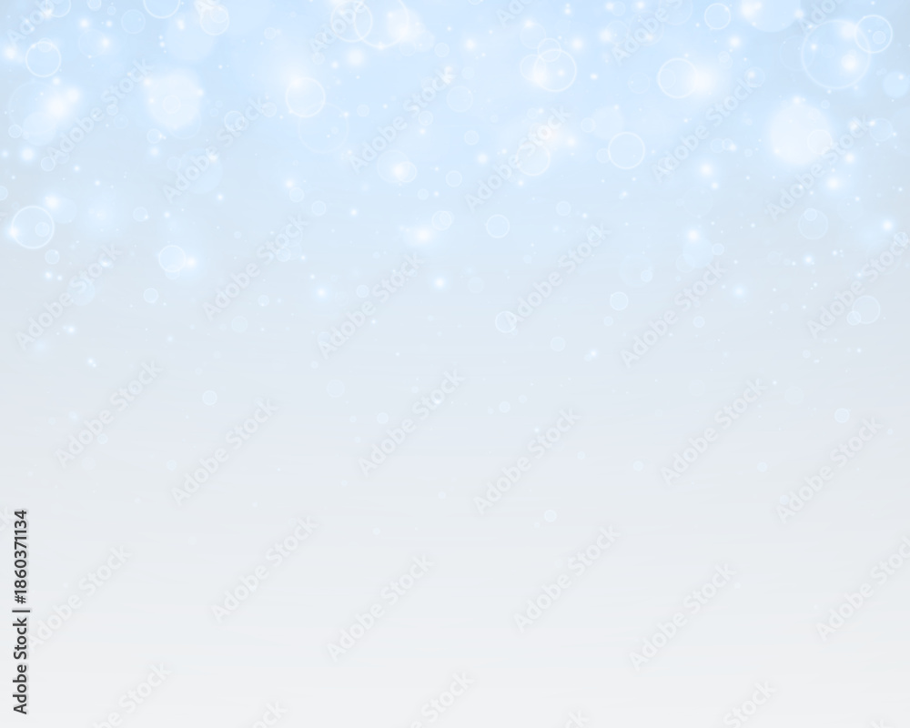 Fototapeta premium Festive background with shimmering light, bokeh and sparkling stardust.