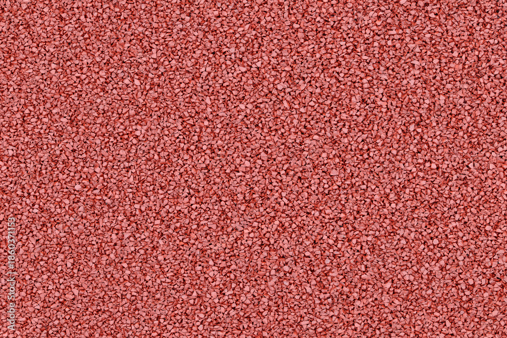 Fototapeta premium High resolution full frame texture of a red rubber granule surface typically used for sports tracks.