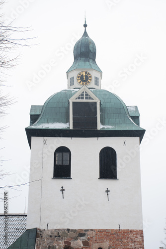 The bell tower of Porvoo Cathedral Finland in a snow shower