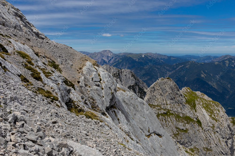 Fototapeta premium Alpspitze and Zugspitze mountains in Germany and Austria, Garmisch-Partenkirchen town in Bavaria region. Highest mountain of Germany, via ferrata on Alpshpitze beautiful mountain alpine landscape