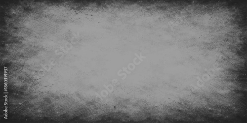 Aged vintage grunge paper texture with a dark gray old concrete wall pattern and a rough textured dirty stone surface design for a blank gray background
