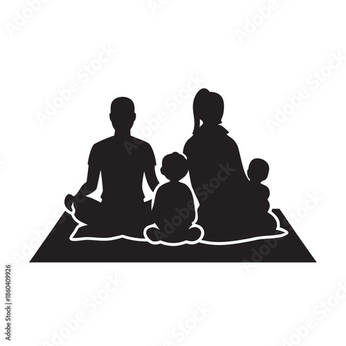 Family Sitting On Picnic Blanket Outdoors