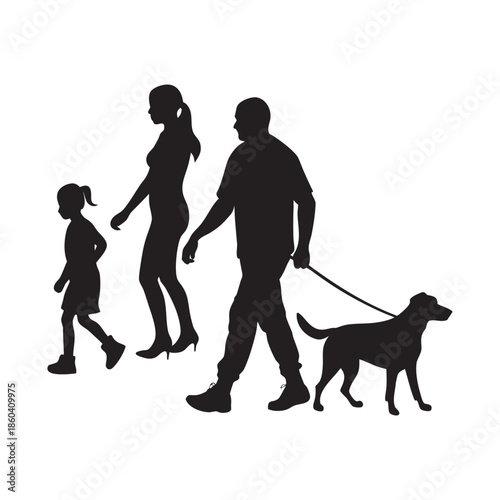 Family Walking Dog Together In Park