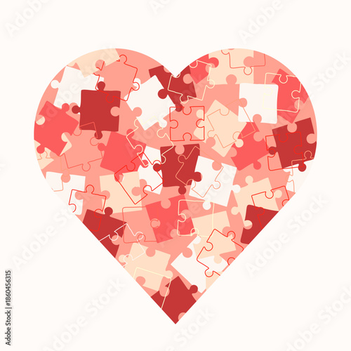 Puzzle heart in red and pink tones, romantic heart-shaped design element, love symbol, isolated on white background.