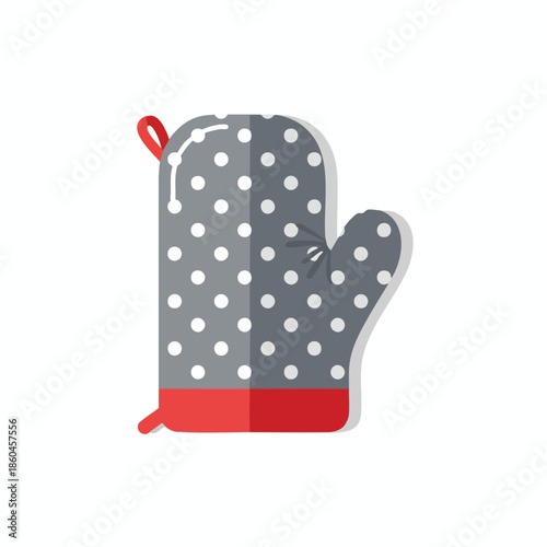 A gray oven mitt with white polka dots, red cuff, loop, on a white backdrop