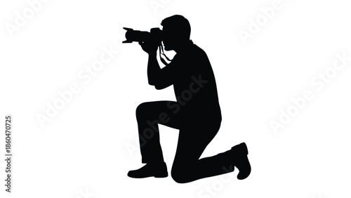 Photographer kneeling with camera silhouette vector