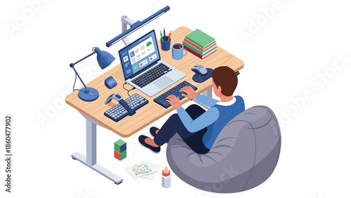 Young professional working on laptop at modern home office desk