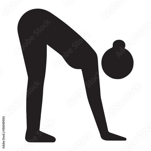 Silhouette of a person performing a forward bend yoga pose for flexibility and relaxation