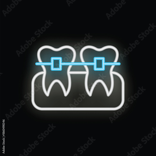 Neon sign depicting teeth with braces glowing on a dark background, representing dental health