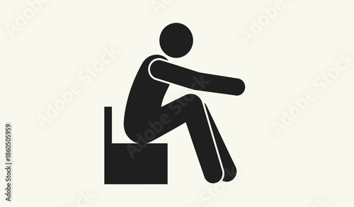 A simple black silhouette of a person sitting in a chair