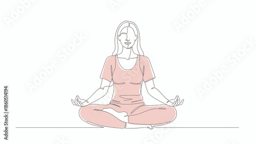 Woman sitting in lotus position with eyes closed in a peaceful pose