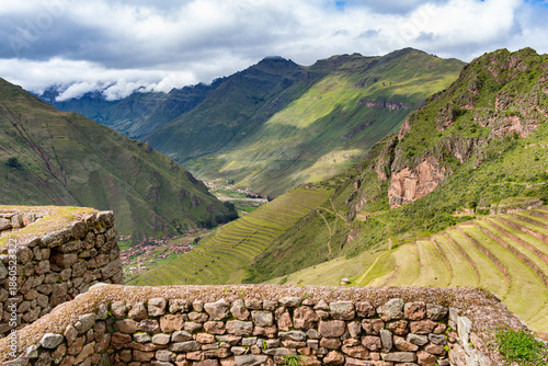 Scenic view overlooking the lush green landscape of the Sacred Valley of the Incas. View from Pisac Archaeological Site