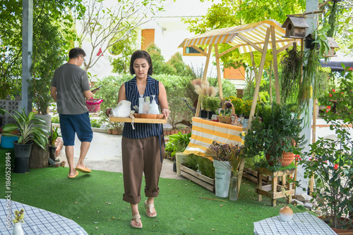 A heartwarming lifestyle series of a middle-aged Asian couple enjoying a relaxing home spa session. The man is seen lovingly caring for his wife by giving her a hand and foot massage